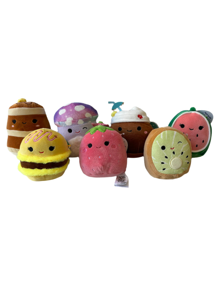 Colorful toy set resembling a sandwich, cake, and watermelon