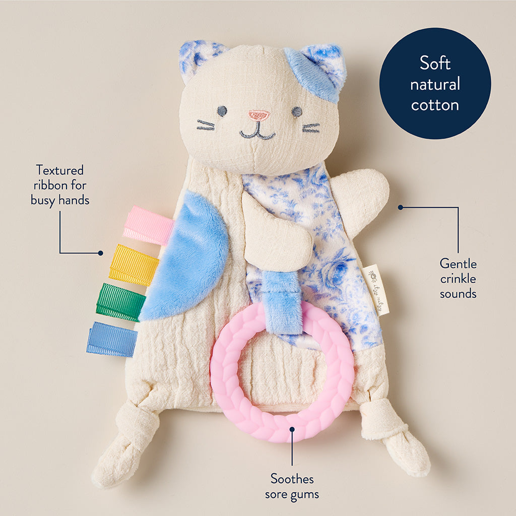 Cat-shaped soft toy with crinkle elements on a beige background