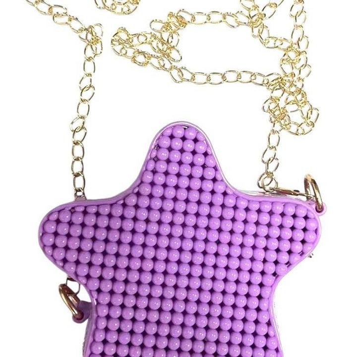 mini jelly bubble bag in the shape of a star in the color purple. gold chain crossbody bag. 