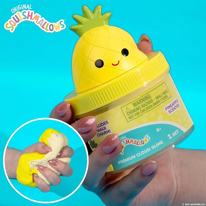 Squishmallows pineapple cloud slime toy with packaging on a blue background