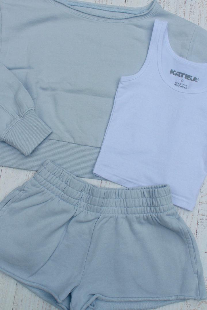 baby blue sweatset with a white tank to layer under the sweatshirt. 