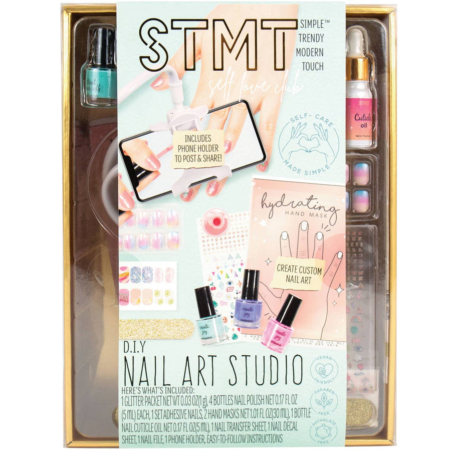STMT DIY Nail Art Studio kit with various items in a box