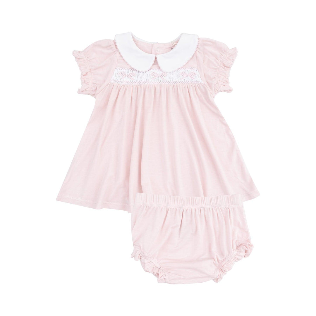 baby girl dress with peter pan collar, smocking across the chest and bows on the smocking. matching pink bloomers to go with the dress