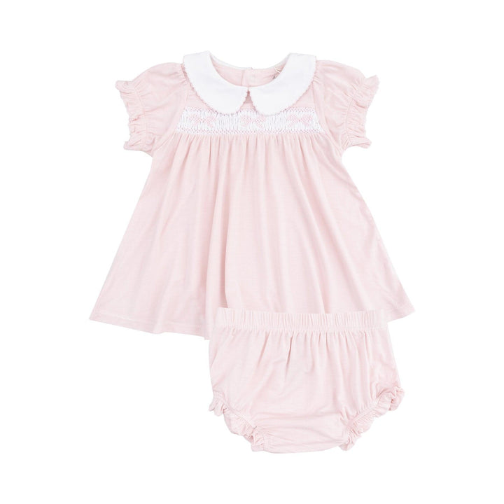 baby girl dress with peter pan collar, smocking across the chest and bows on the smocking. matching pink bloomers to go with the dress