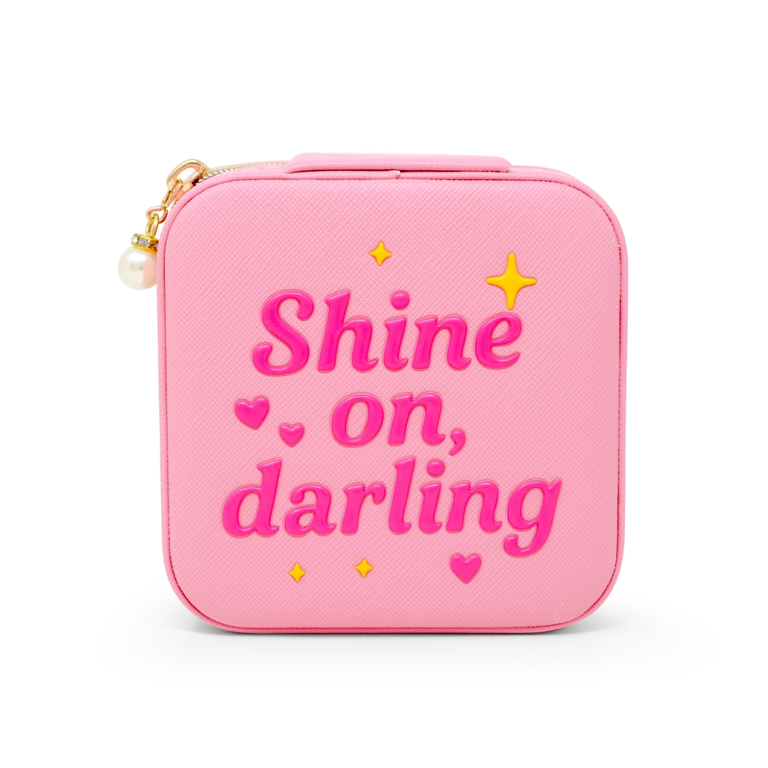 the top of the jewelry box that reads "Shine on Darling" 