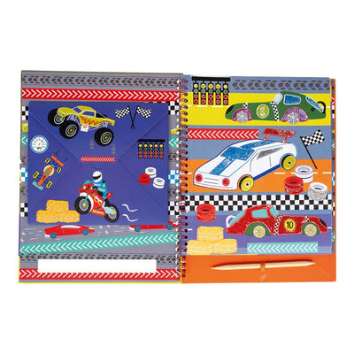 the inside pages of the craft book showing cars and how the foil can accent the pages. 