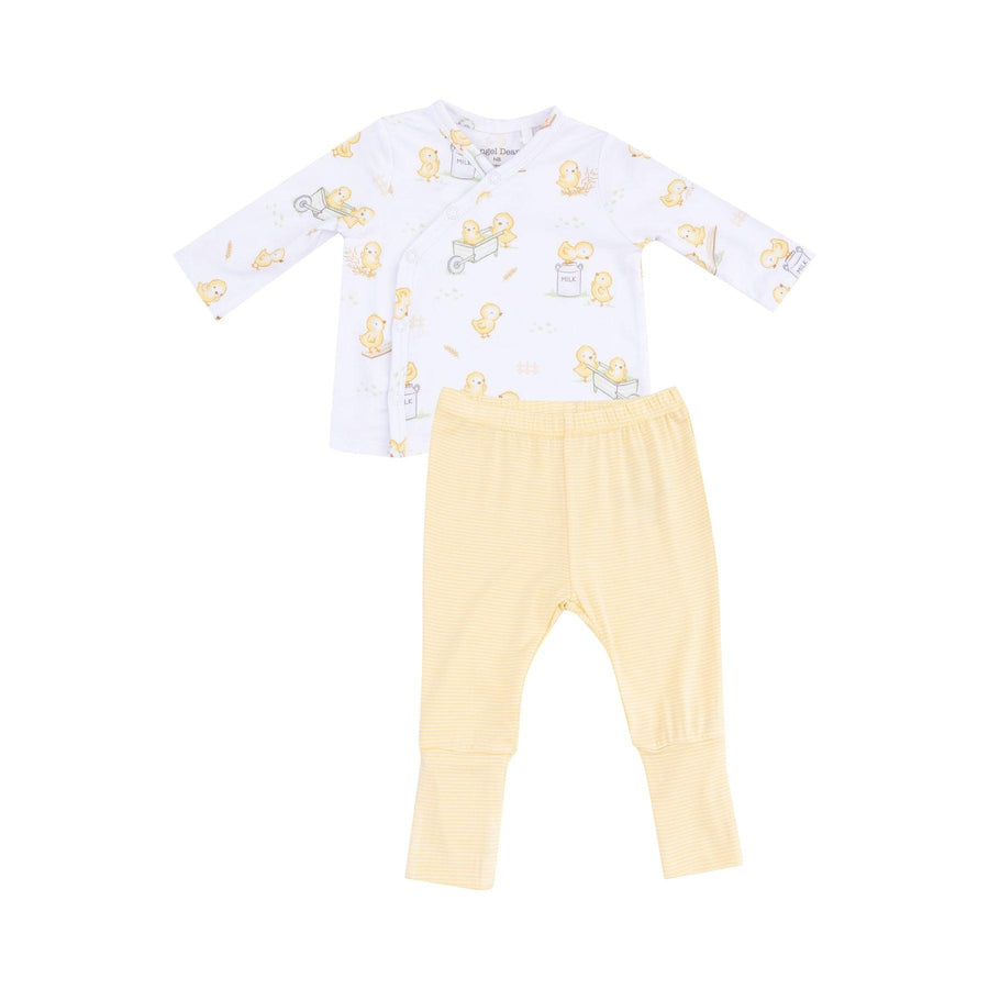 take home set with baby chicks playing on the top and yellow stripe bottom. two pieces 