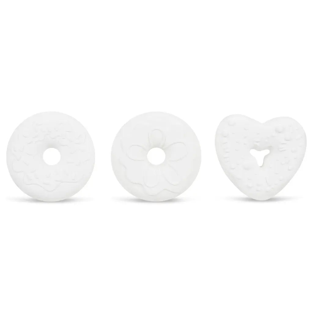 Three white heart-shaped objects on a white background