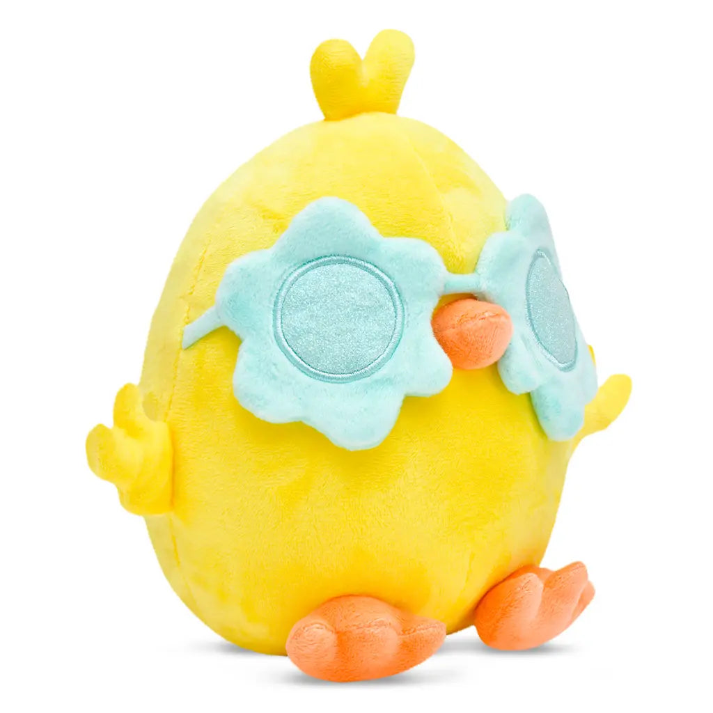 Yellow plush toy with floral sunglasses on a white background