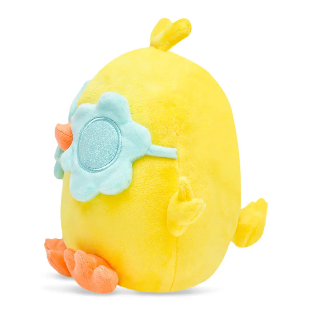Yellow plush toy with a flower sunglasses on a white background