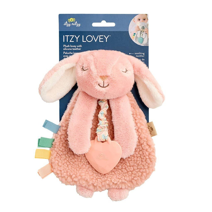 bunny attached to the vendor packaging with teether and ribbons attached. 