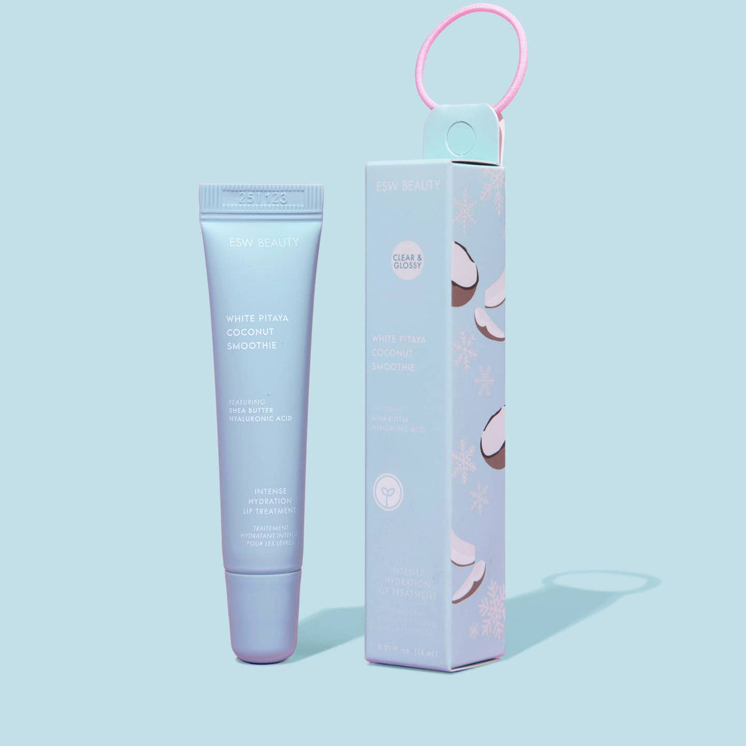 Lip Balm tube and packaging on a light blue background