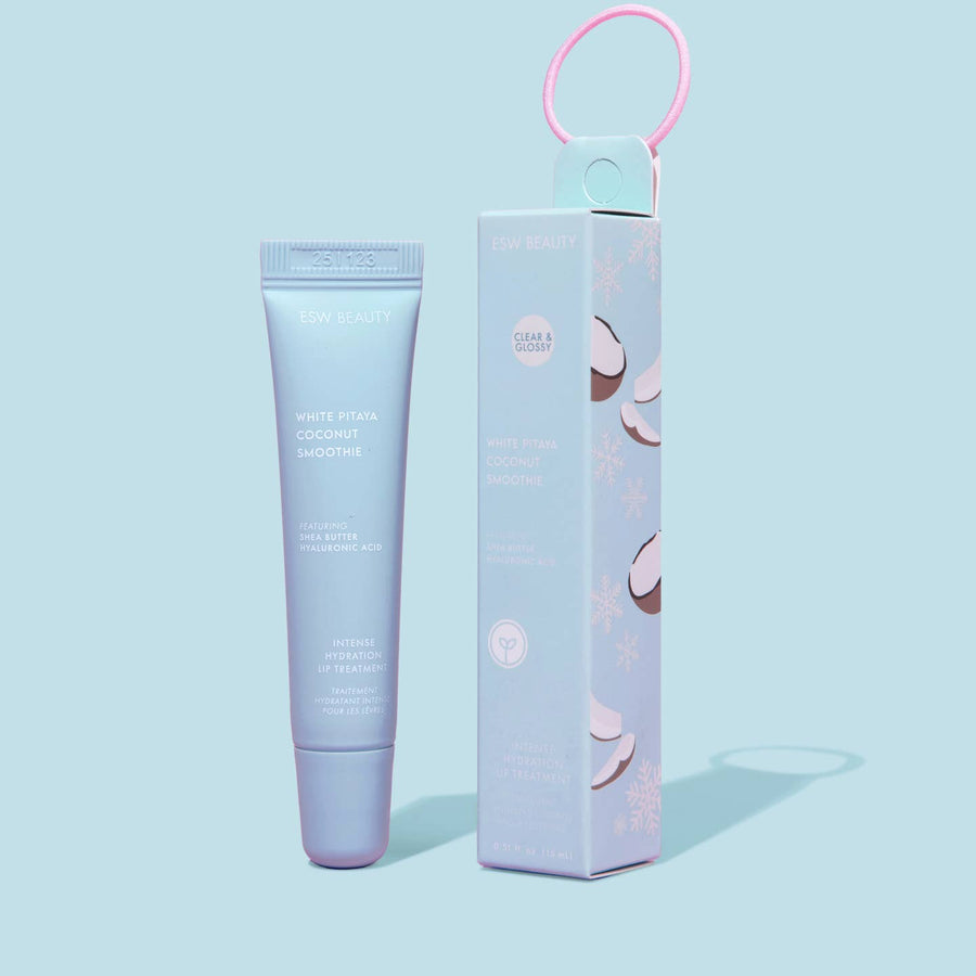 Lip Balm tube and packaging on a light blue background