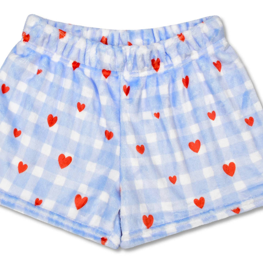 Flannel shorts with red heart pattern on a blue and white checkered background