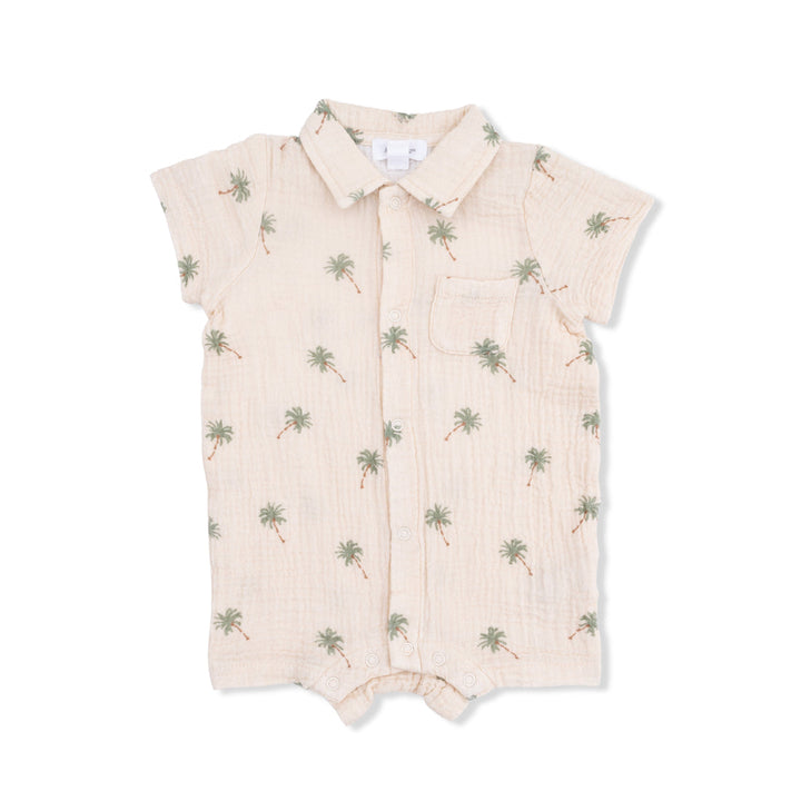 Beige baby romper with palm tree pattern on a white background