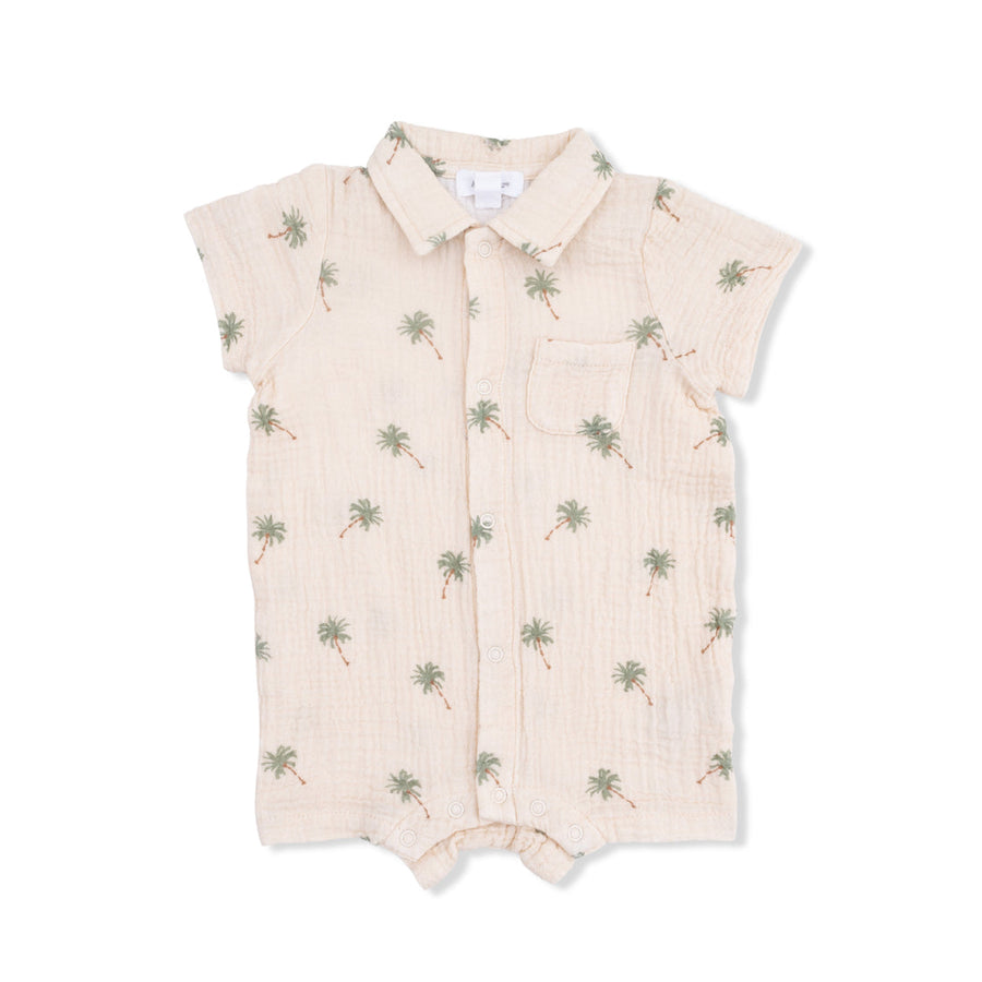 Beige baby romper with palm tree pattern on a white background
