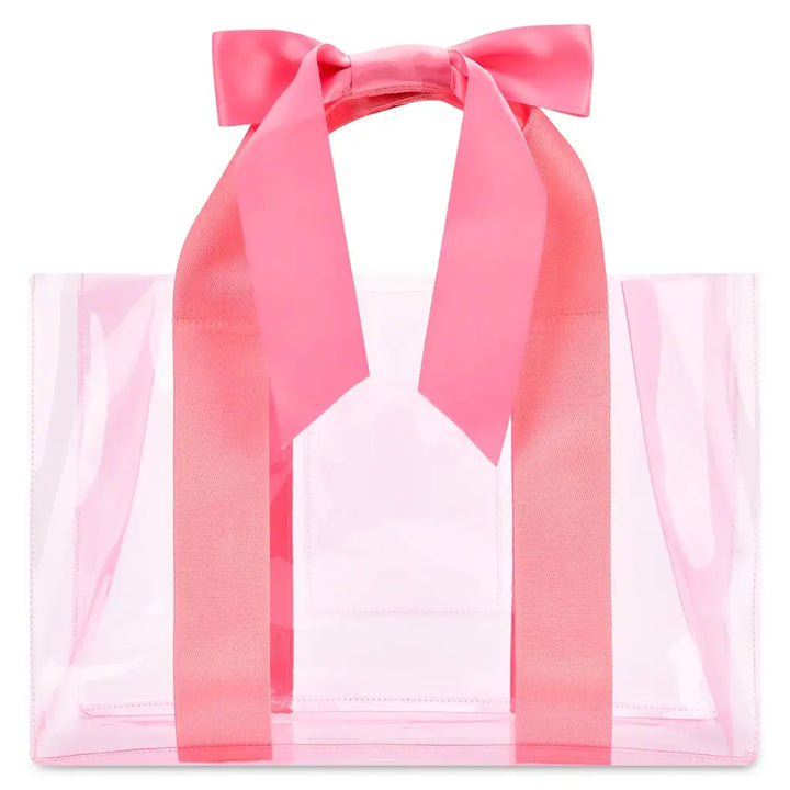 A clear vinyl tote bag with a large pink satin bow on the handle, shown against a plain white background.