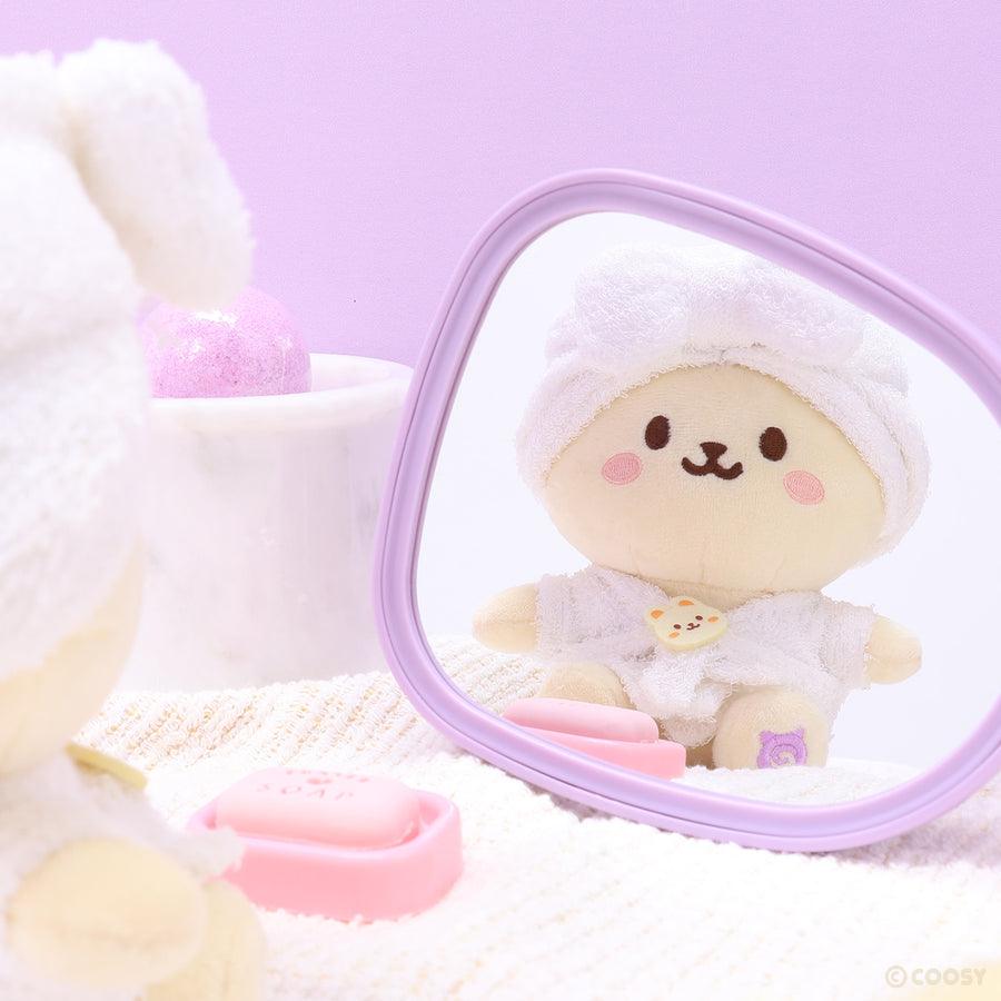 plush bunny wearing a white spa bath robe and spa turban for all of the spa treatments. 
