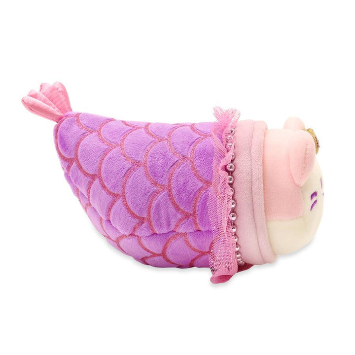 this is the mermaid plush from the side The mermaid tale is purple. 