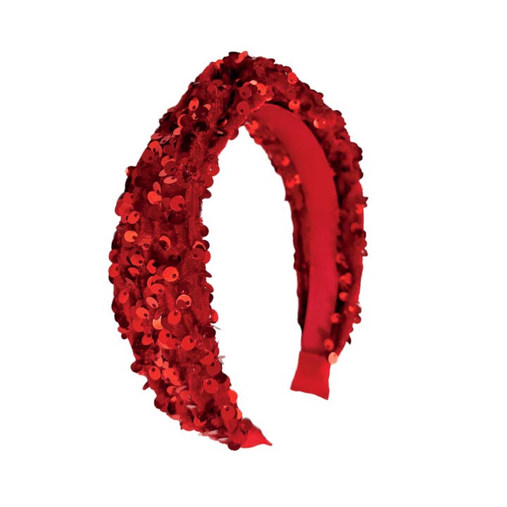 red velvet headband with covered in red sequins. 