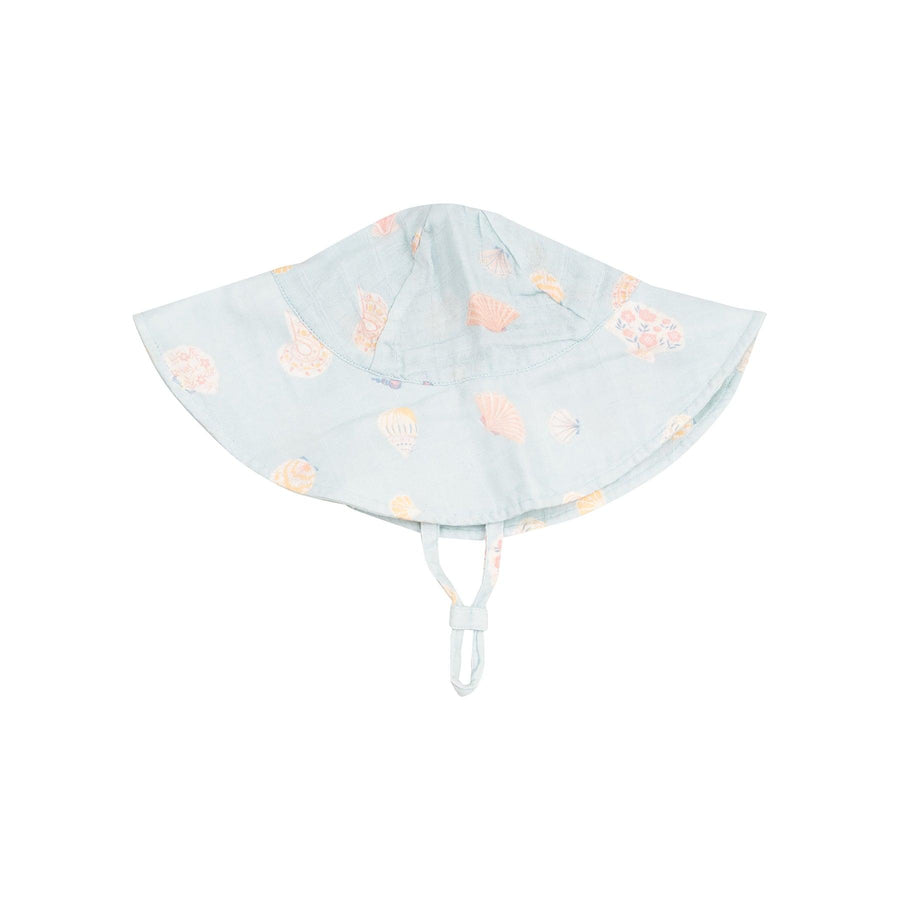 ice blue hat with pretty beige seashells printed on the hat. 