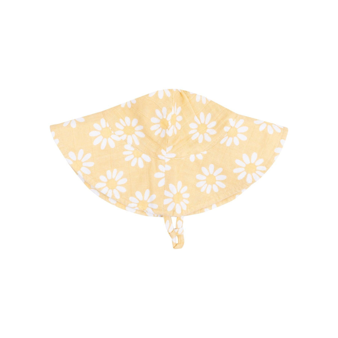 baby sunhat in yellow with white daisies all over  it
