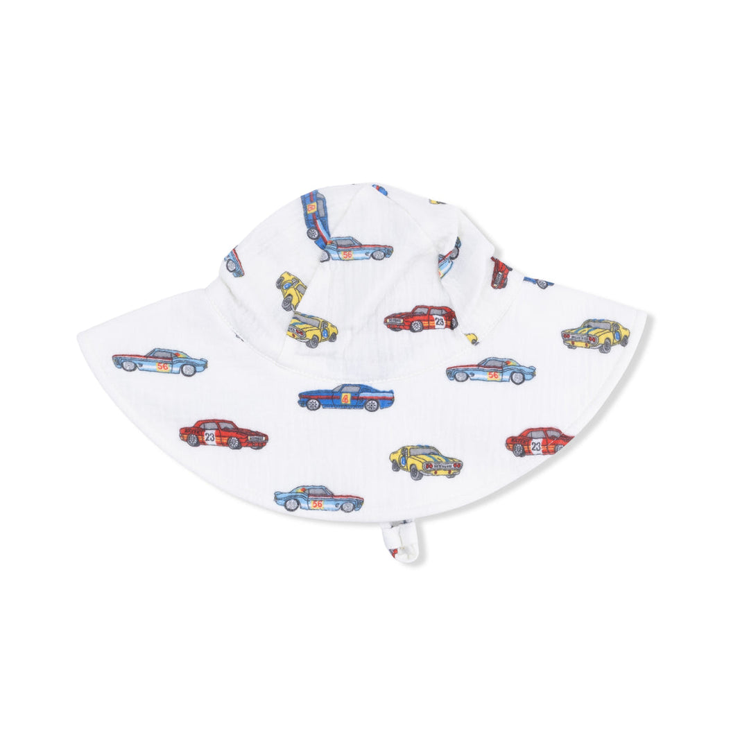 White  hat with colorful car pattern on a white background