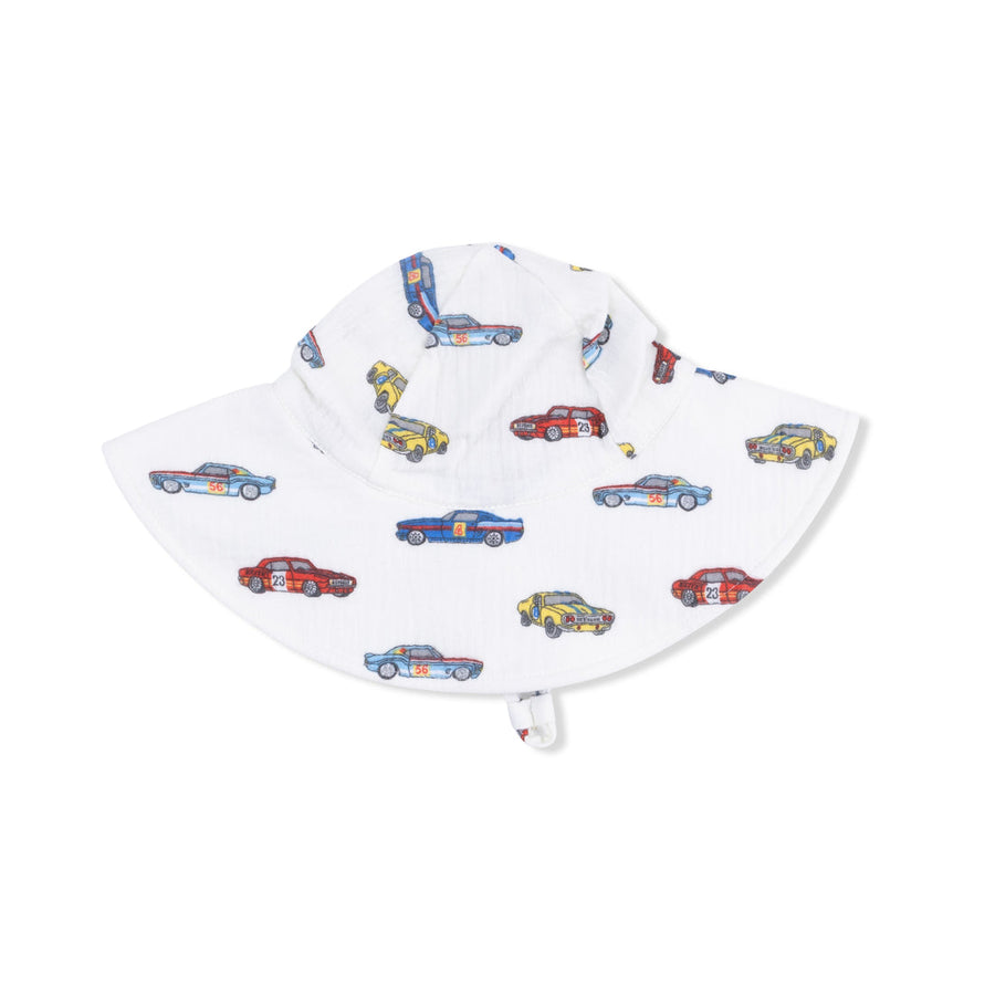 White  hat with colorful car pattern on a white background