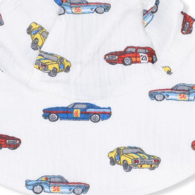 White bucket hat with colorful car pattern on a white background
