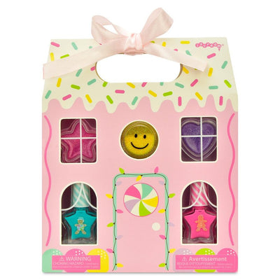 gingerbread house packaging with nail polish, shimmer and nail art inside the box