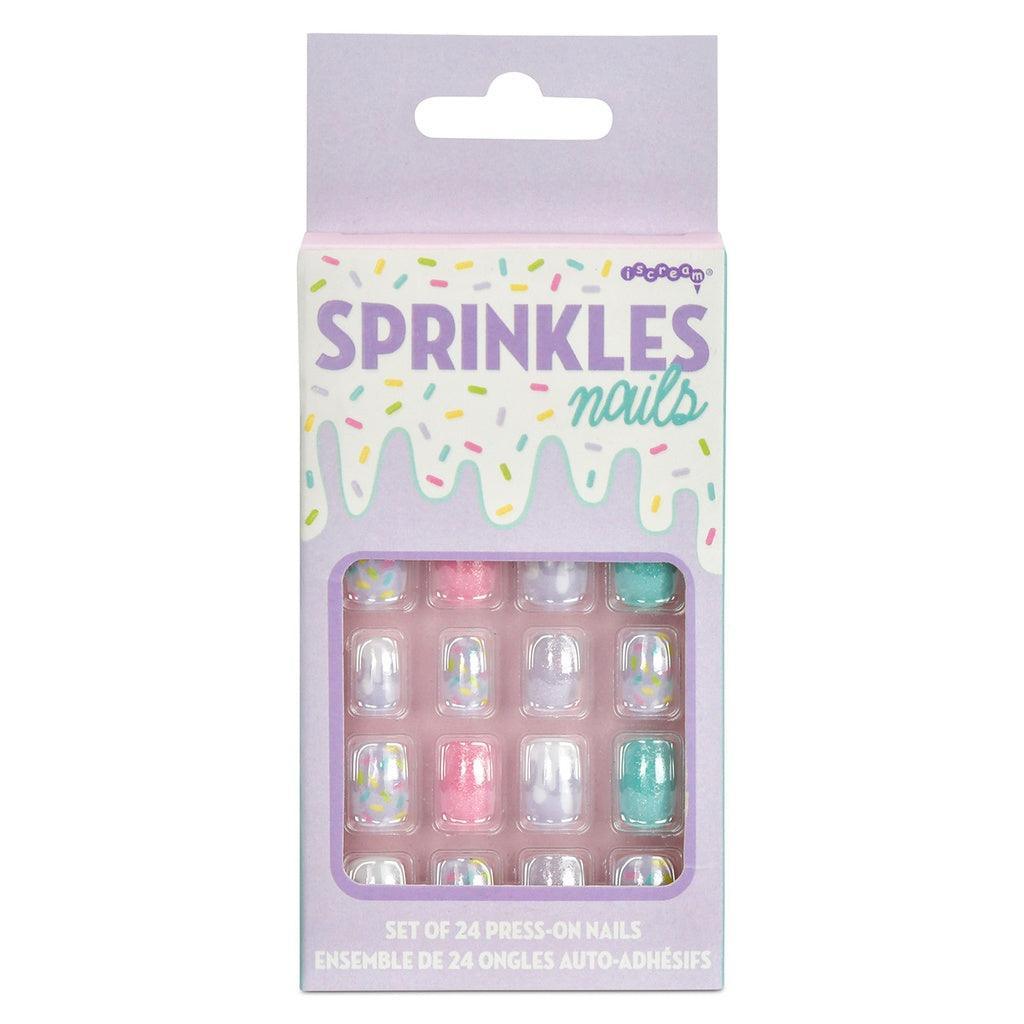 press on nails that are sold pink, teal and have sprinkles are decorations on them. 