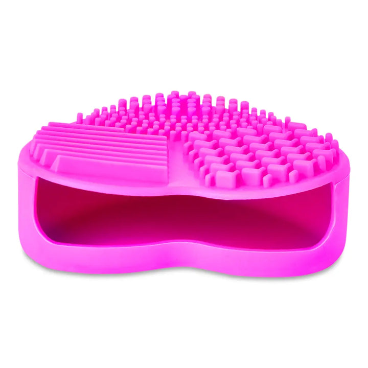 Pink silicone scrubber on a white background