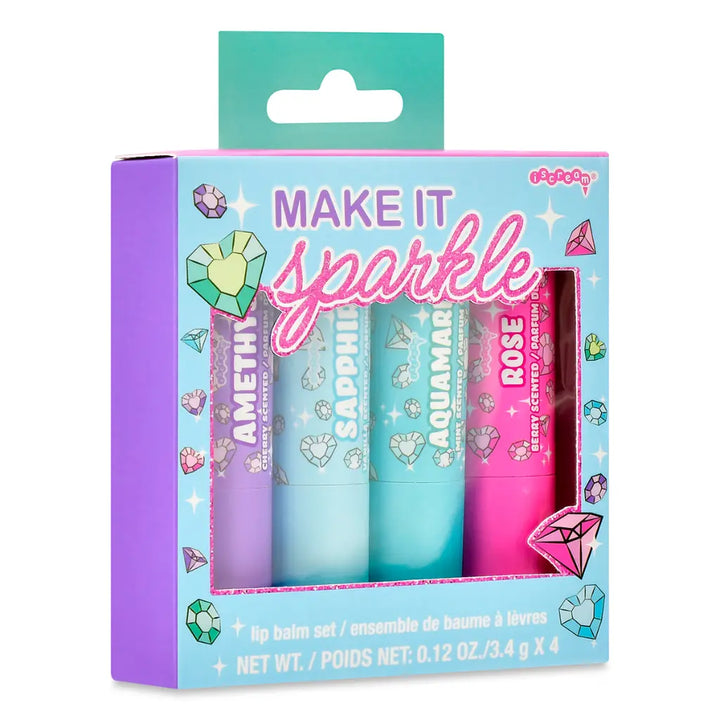 Packaging of 'Make It Sparkle' lip balm set with colorful design and product names.