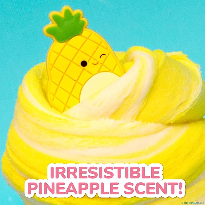 Yellow fluffy product with a pineapple-shaped character on a blue background, featuring text 'IRRESISTIBLE PINEAPPLE SCENT!'.