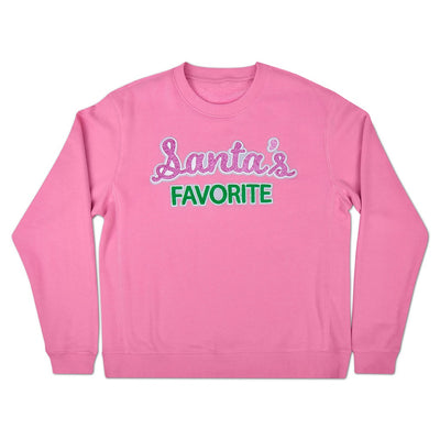 girls pink sweatshirt has Santa's Favorite written on it. 