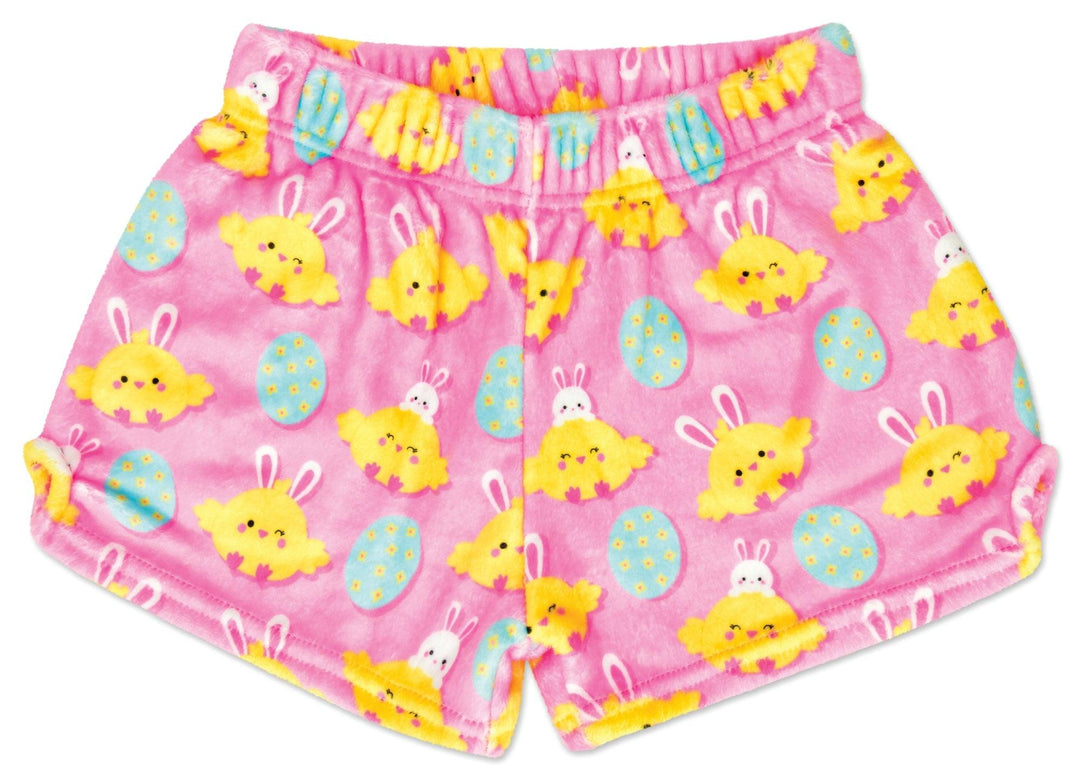 pink plush shorts with yellow chick wearing bunny ears on the front, blue easter egg with flowers on it and a tiny bunny playing with a chick. 