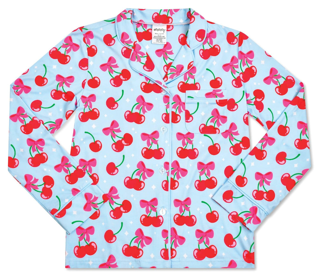 lounge top is button down and with a pocket and notch collar. the top is baby blue with red cherries and pink bow at the cherry stems. 