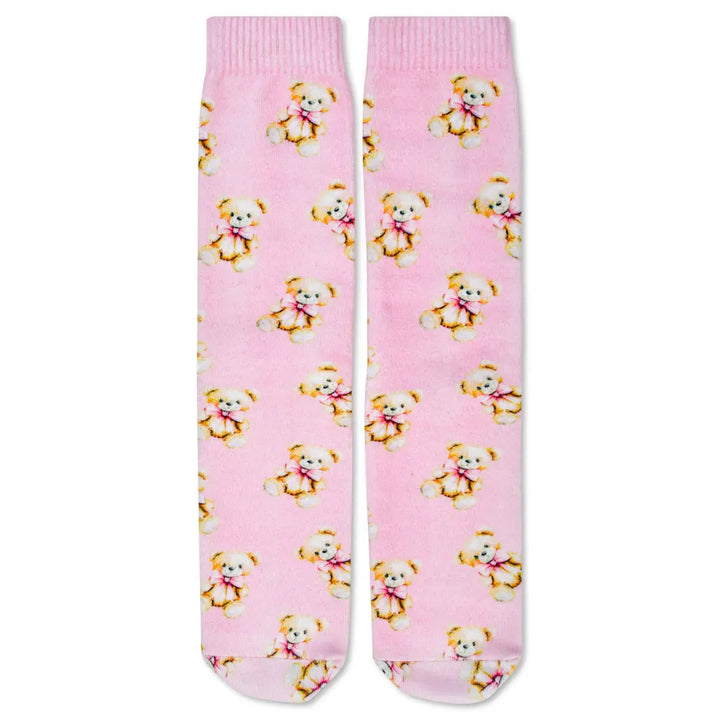 Pink socks with teddy bear pattern on a white background