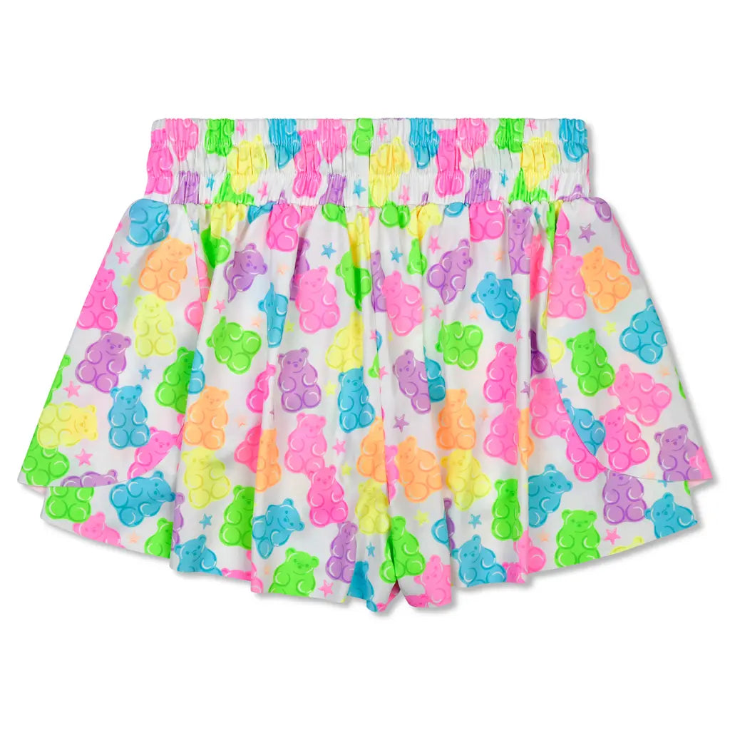 Shorts with colorful gummy bear pattern on a white background