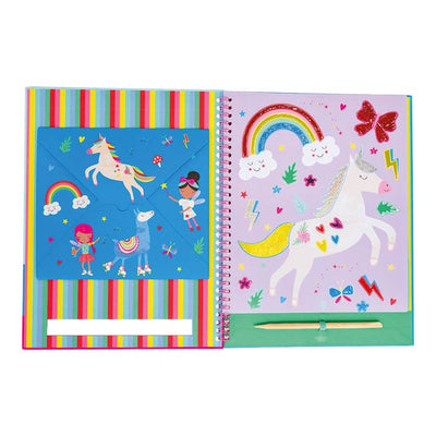 inside pages of craft book this has a unicorn pictured with a rainbow and having the foil to accent the picture