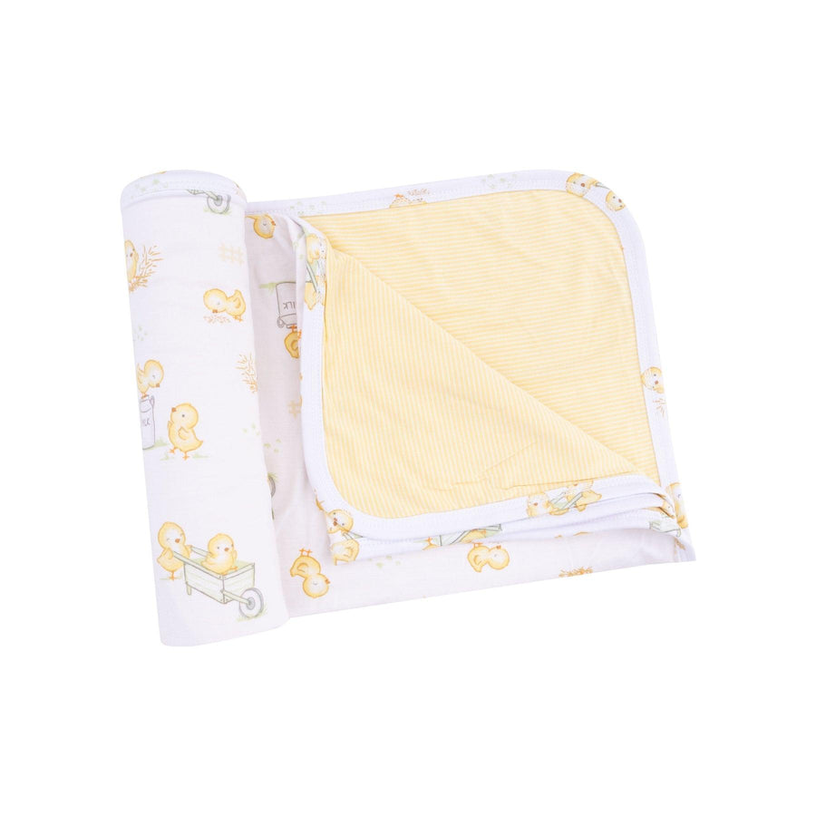 burp cloth with yellow stripes on one side and baby chicks playing games on the other side of the burp cloth. 