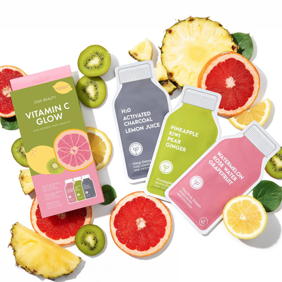 Four skincare product, face masks with colorful labels on a white background with fruit slices. 