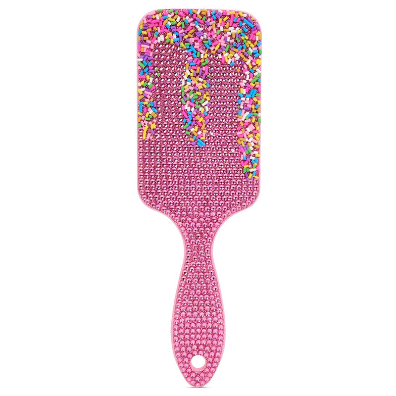 Iscream Sprinkle Sparkle Paddlebrush with lots of sparkles and sprinkles.