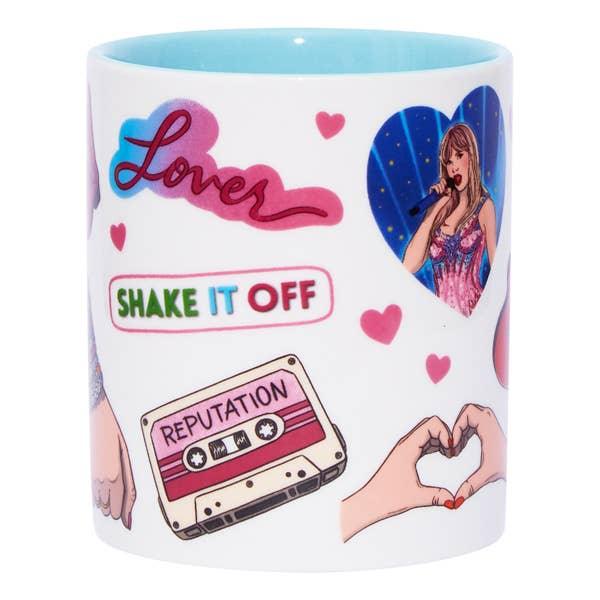 This part of the mug showa a cassette tape that says "reputation' and shake it off 