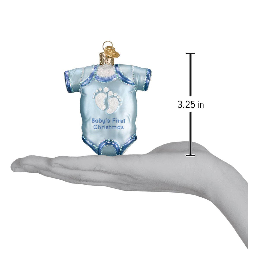 Blue baby onesie ornament with 'Baby's First Christmas' text on a hand for scale, showing a height of 3.25 inches.
