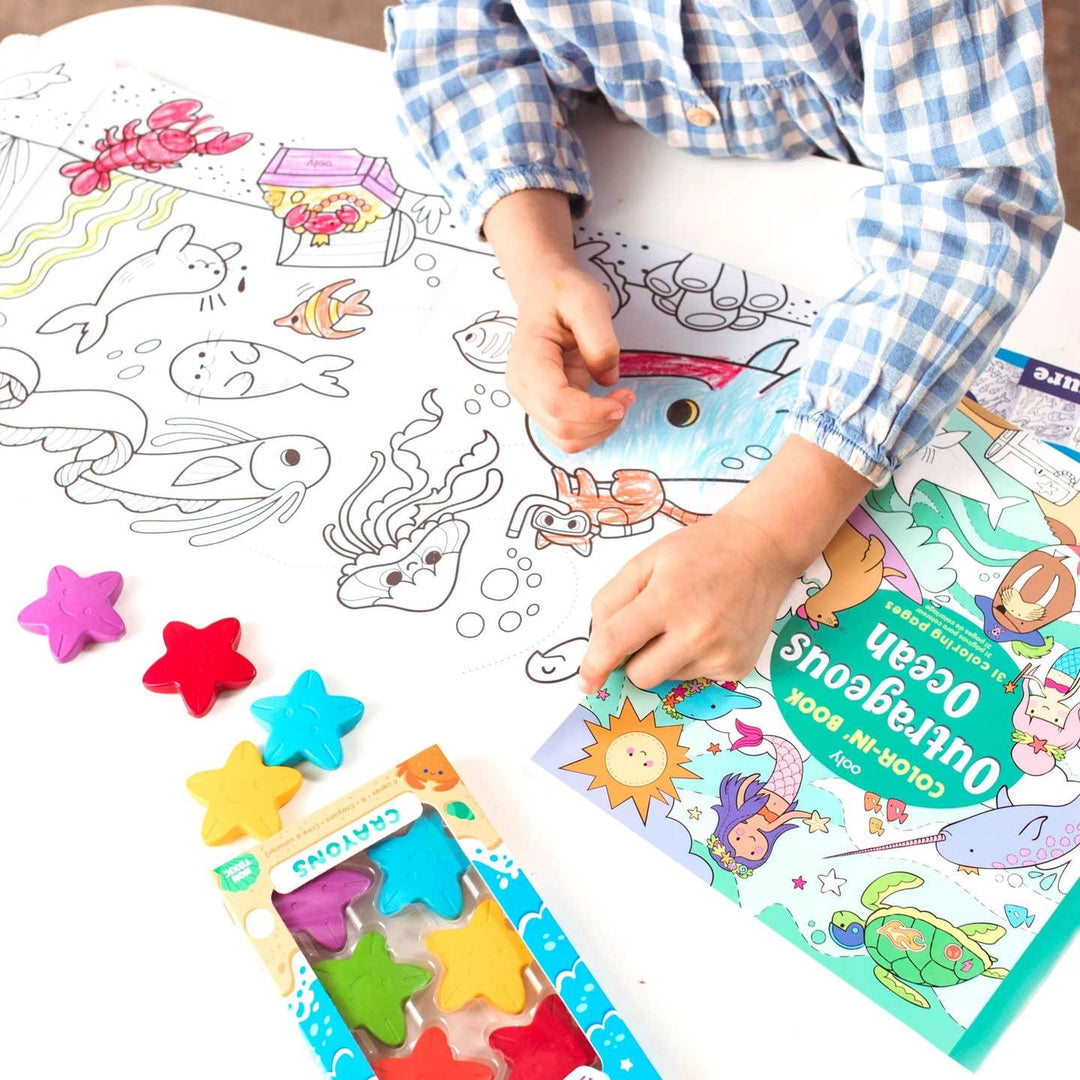 this picture shows a child coloring in a picture with the star crayons. 