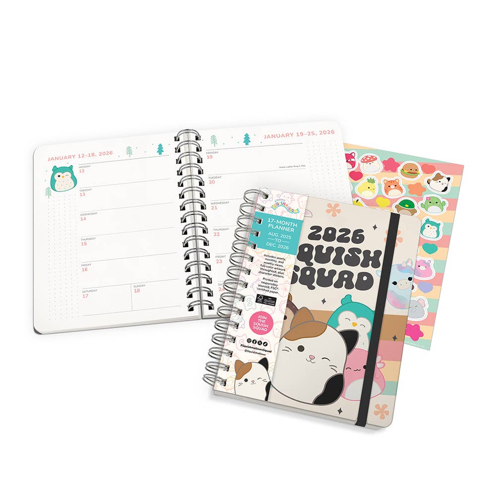 Spiral-bound planner with a cat illustration and colorful cover on a white background