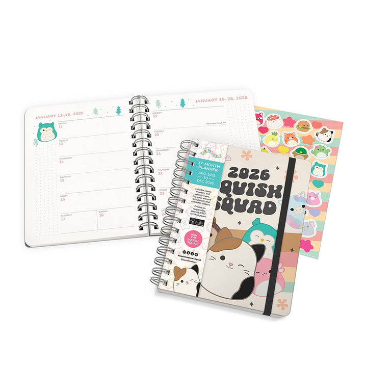 Spiral-bound planner with a cat illustration and colorful cover on a white background
