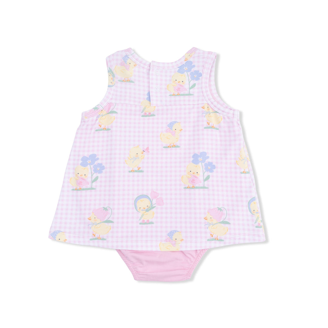 Baby romper with duck and flower pattern on a white background