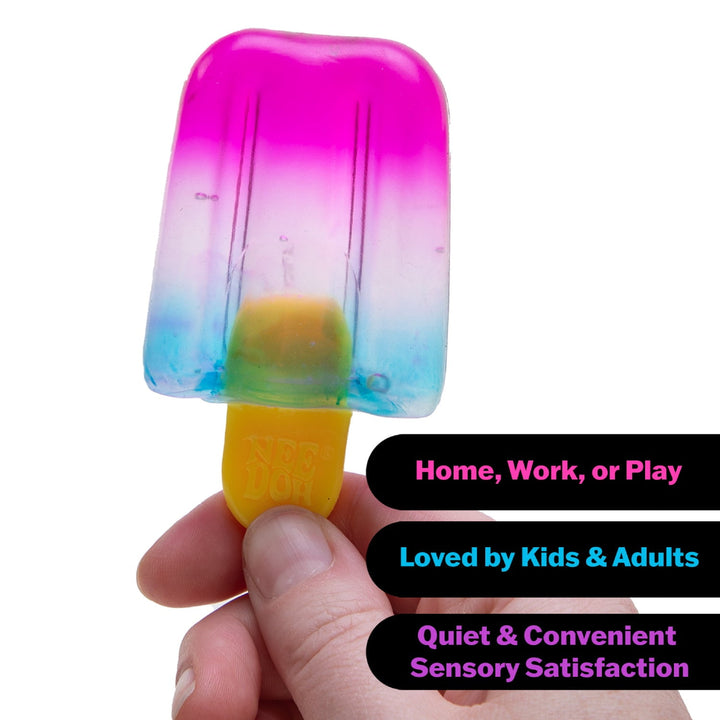 Colorful popsicle-shaped toy held by a hand with text about its uses.